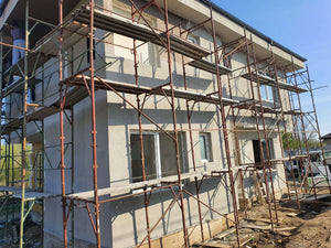 Finalisation de l'application de mastic pour le projet de maison de 155 mètres carrés thumbnail