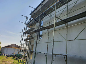 Finalisation de l'application de mastic pour le projet de maison de 155 mètres carrés thumbnail