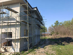 Finalisation de l'application de mastic pour le projet de maison de 155 mètres carrés thumbnail