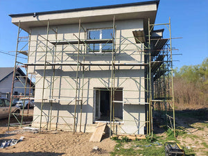 Finalisation de l'application de mastic pour le projet de maison de 155 mètres carrés thumbnail