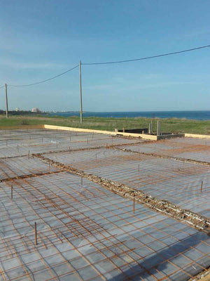 Excavation et coulage de béton pour la fondation du projet de 250 mètres carrés thumbnail