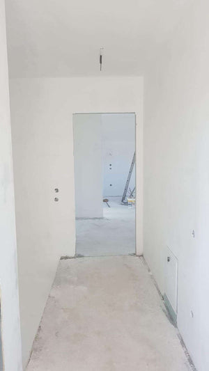 Ponçage des murs intérieurs et application d'une couche d'apprêt et de mastic pour la maison à Saftica thumbnail
