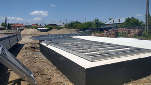 Imperméabilisation de la fondation et préparation pour le montage de la structure métallique thumbnail