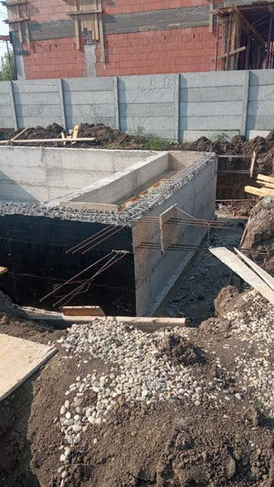 Imperméabilisation de la fondation et coulée de la dalle à la cote zéro pour la villa sur structure métallique thumbnail
