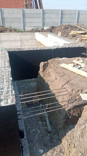 Imperméabilisation de la fondation et coulée de la dalle à la cote zéro pour la villa sur structure métallique thumbnail