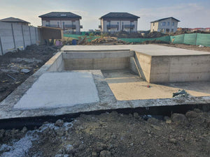 Imperméabilisation de la fondation et coulée de la dalle à la cote zéro pour la villa sur structure métallique thumbnail