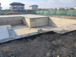 Imperméabilisation de la fondation et coulée de la dalle à la cote zéro pour la villa sur structure métallique thumbnail