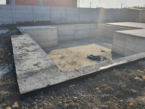 Imperméabilisation de la fondation et coulée de la dalle à la cote zéro pour la villa sur structure métallique thumbnail