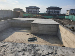 Imperméabilisation de la fondation et coulée de la dalle à la cote zéro pour la villa sur structure métallique thumbnail