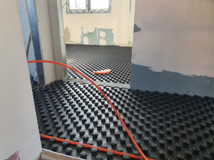 Chauffage par le sol et coulée de chapes pour une maison individuelle thumbnail