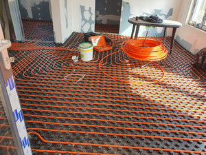 Chauffage par le sol et coulée de chapes pour une maison individuelle thumbnail