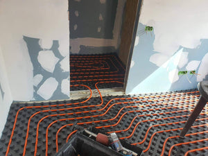 Chauffage par le sol et coulée de chapes pour une maison individuelle thumbnail