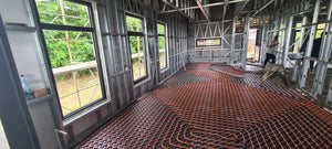 Chauffage par le sol et coulage d'une chape pour une maison de plain-pied de 130 mètres carrés thumbnail