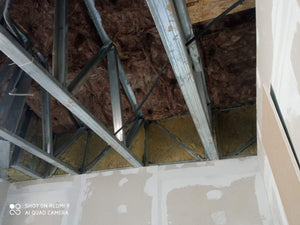 Isolation des murs extérieurs et des murs de séparation pour une maison sur structure métallique thumbnail