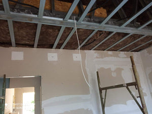 Isolation des murs extérieurs et des murs de séparation pour une maison sur structure métallique thumbnail
