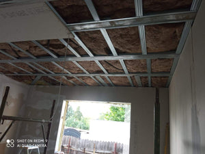 Isolation des murs extérieurs et des murs de séparation pour une maison sur structure métallique thumbnail