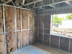 Isolation des murs extérieurs et des murs de séparation pour une maison sur structure métallique thumbnail