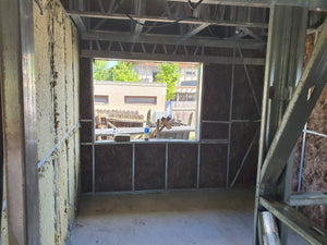 Isolation des murs extérieurs et des murs de séparation pour une maison sur structure métallique thumbnail