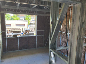 Isolation des murs extérieurs et des murs de séparation pour une maison sur structure métallique thumbnail