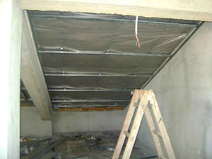 Aménagement des combles de 120 mètres carrés réalisé avec du plâtre ignifuge de couleur rouge thumbnail