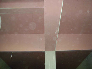 Aménagement des combles de 120 mètres carrés réalisé avec du plâtre ignifuge de couleur rouge thumbnail