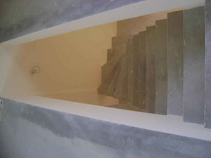 Aménagement des combles de 120 mètres carrés réalisé avec du plâtre ignifuge de couleur rouge thumbnail
