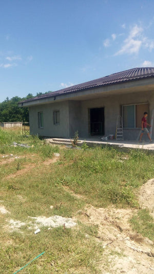 Application de mastic pour le projet de maison de 320 mètres carrés à Snagov thumbnail