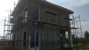 Application de mastic et enduit décoratif pour le projet de maison de 190 mètres carrés thumbnail