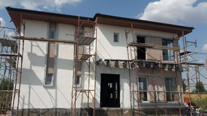 Application de mastic et enduit décoratif pour le projet de maison de 190 mètres carrés thumbnail