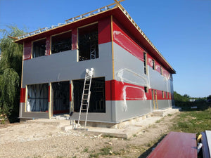 Montage de panneaux sandwich pour la construction d'une halle de 480 mètres carrés thumbnail