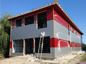 Montage de panneaux sandwich pour la construction d'une halle de 480 mètres carrés thumbnail