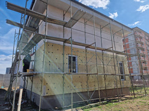 Installation de menuiseries et isolation thermique extérieure en laine de roche pour la maison thumbnail