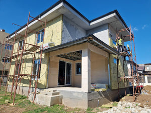Installation de menuiseries et isolation thermique extérieure en laine de roche pour la maison thumbnail