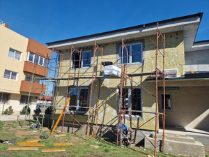 Installation de menuiseries et isolation thermique extérieure en laine de roche pour la maison thumbnail