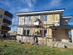 Installation de menuiseries et isolation thermique extérieure en laine de roche pour la maison thumbnail