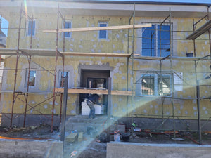 Installation de menuiseries et isolation thermique extérieure en laine de roche pour la maison thumbnail