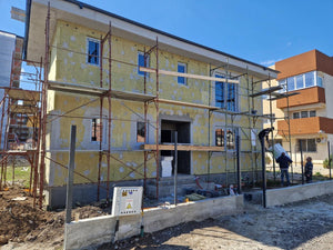 Installation de menuiseries et isolation thermique extérieure en laine de roche pour la maison thumbnail