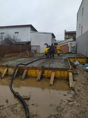 Dalle de fondation coulée mécaniquement pour une maison à étages à Bucarest thumbnail