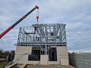 Revêtement extérieur en fibrociment pour une maison sur structure métallique thumbnail