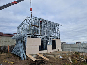 Revêtement extérieur en fibrociment pour une maison sur structure métallique thumbnail
