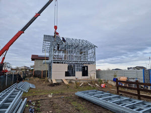 Revêtement extérieur en fibrociment pour une maison sur structure métallique thumbnail