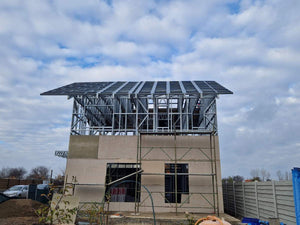 Revêtement extérieur en fibrociment pour une maison sur structure métallique thumbnail