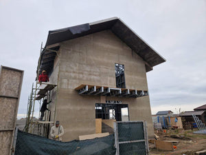 Revêtement extérieur en fibrociment pour une maison sur structure métallique thumbnail