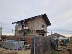 Revêtement extérieur en fibrociment pour une maison sur structure métallique thumbnail
