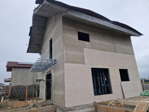 Revêtement extérieur en fibrociment pour une maison sur structure métallique thumbnail