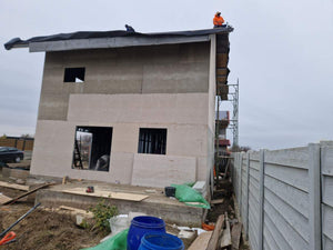 Revêtement extérieur en fibrociment pour une maison sur structure métallique thumbnail