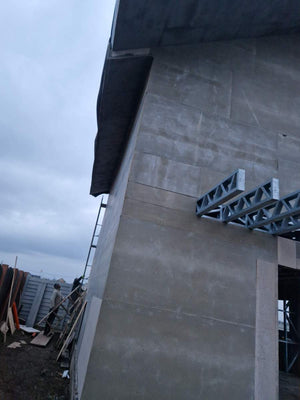 Revêtement extérieur en fibrociment pour une maison sur structure métallique thumbnail