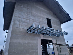 Revêtement extérieur en fibrociment pour une maison sur structure métallique thumbnail