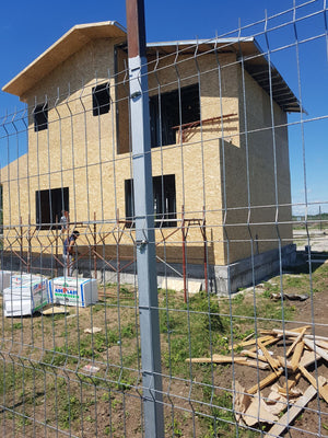 Finalisation du revêtement extérieur en panneaux OSB pour le projet de maison à Domnesti thumbnail