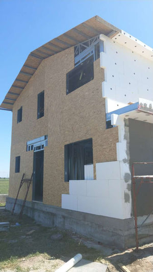 Projet de système d'isolation thermique pour une maison en structure métallique à Domnesti thumbnail